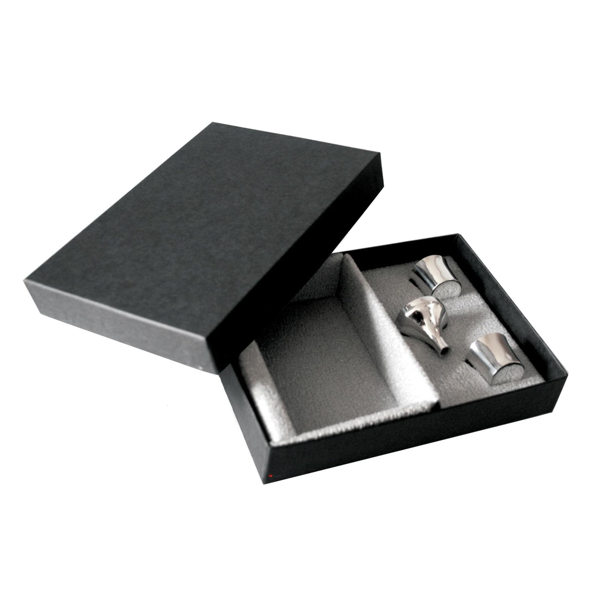 Black jewelry box with silver jewelry inside on a white background
