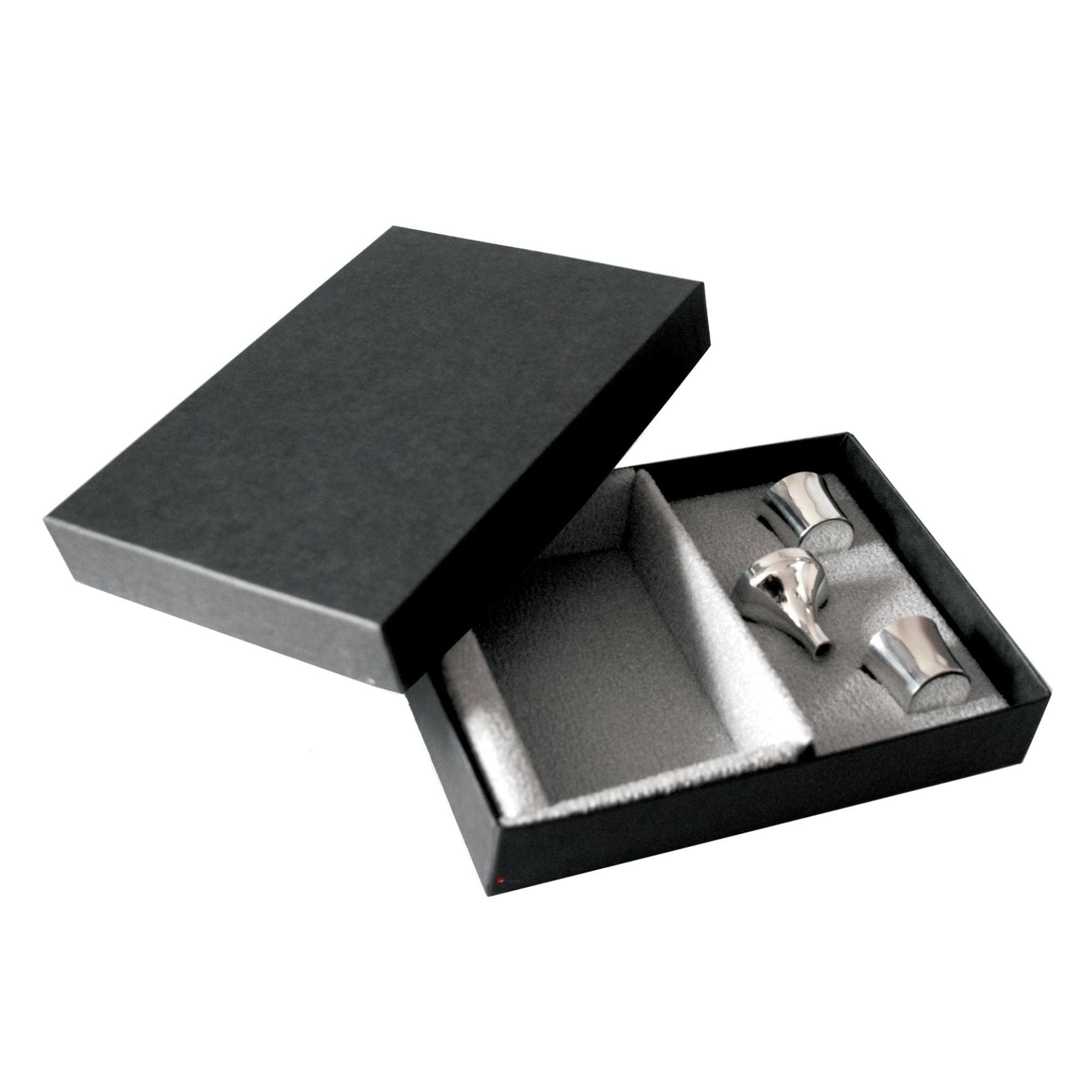 Black jewelry box with silver jewelry inside on a white background
