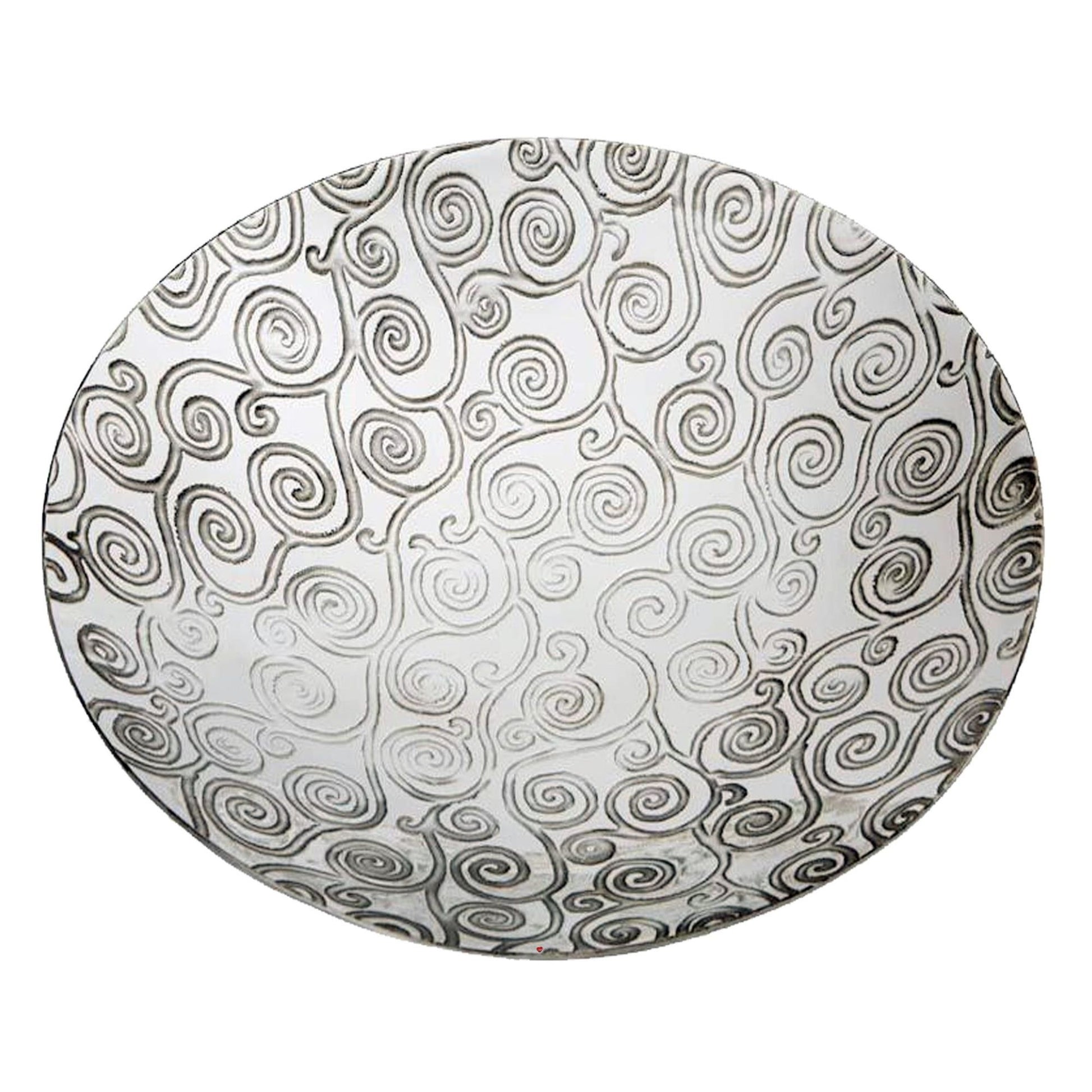Round plate with black and white spiral pattern on a white background
