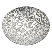 Decorative plate with black floral and animal pattern on a white background