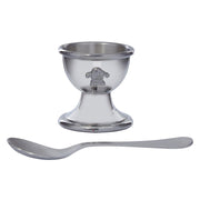 Silver egg cup with spoon on a white background