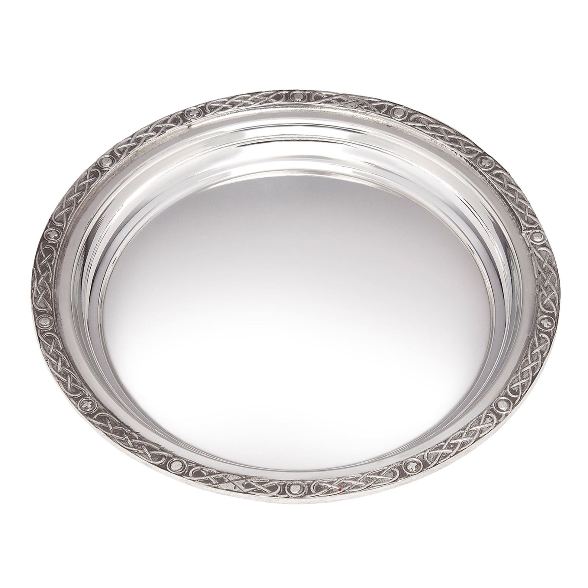 Silver decorative plate with intricate patterns on a white background