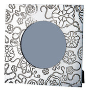 Decorative mirror with floral patterns and a central round mirror