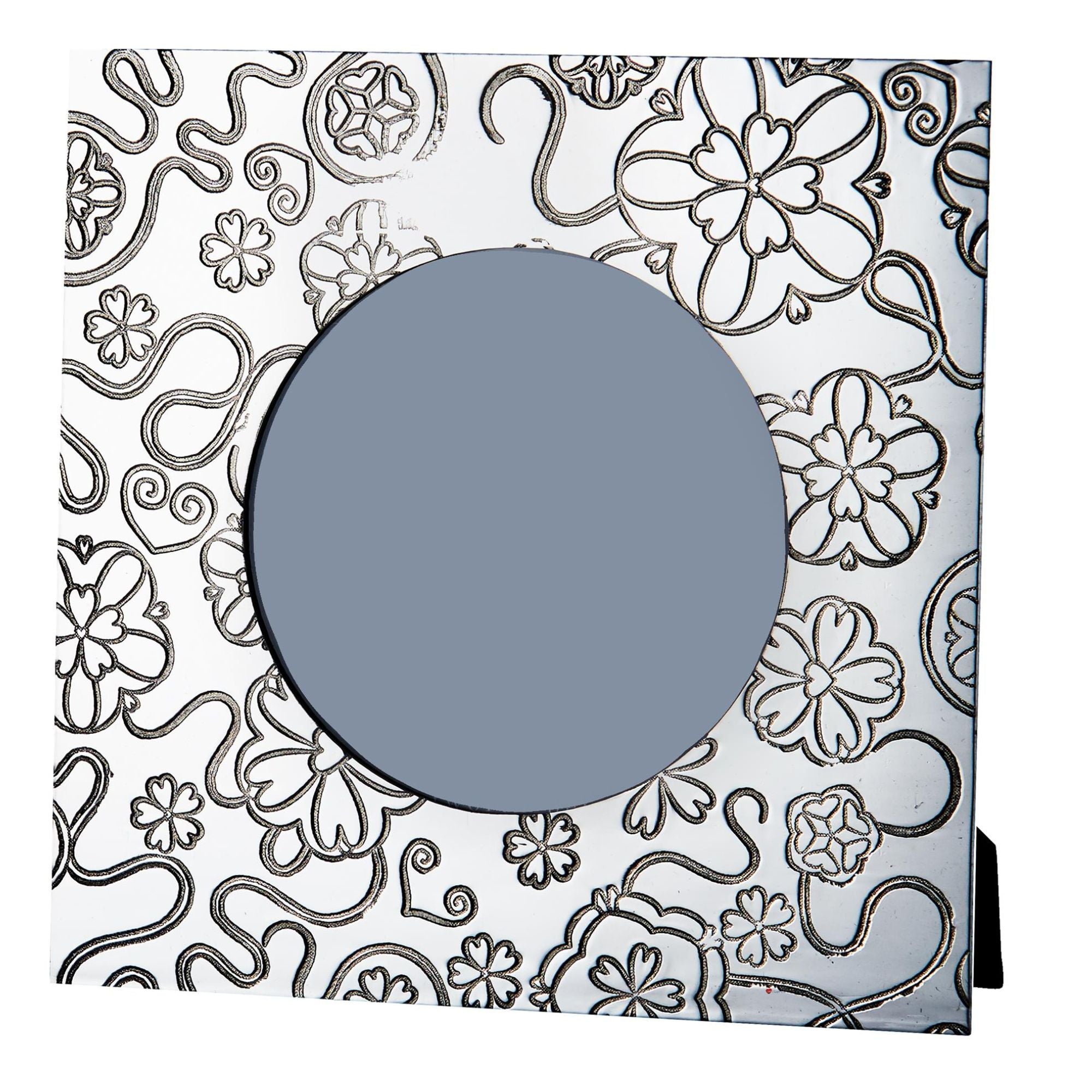 Decorative mirror with floral patterns and a central round mirror