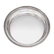 Silver round tray with beaded edge on a white background