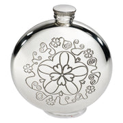 Silver flask with floral engraving on a white background