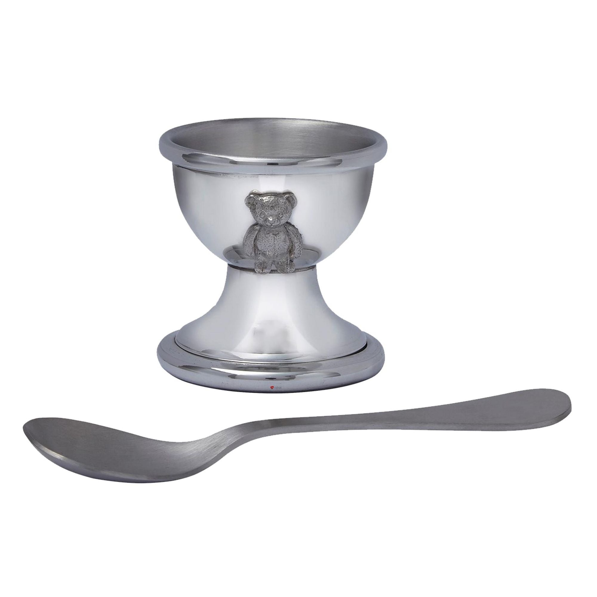 Silver egg cup with teddy bear design and matching spoon on a white background