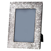 Decorative photo frame with skull pattern on a white background