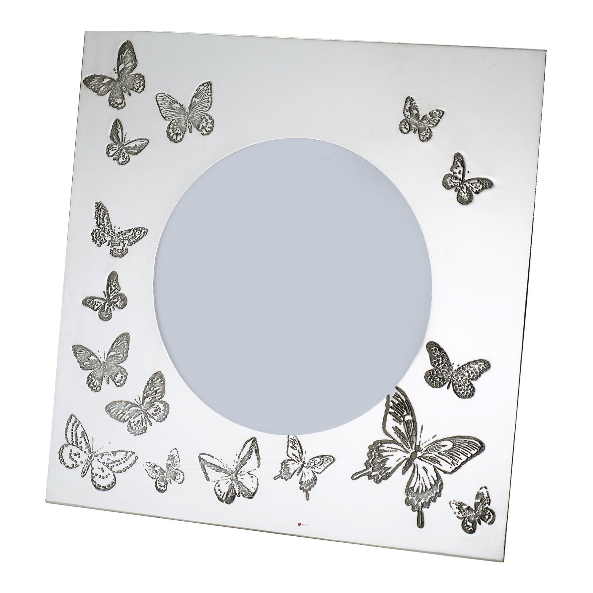 Decorative mirror with silver butterflies around a central round mirror on a white background