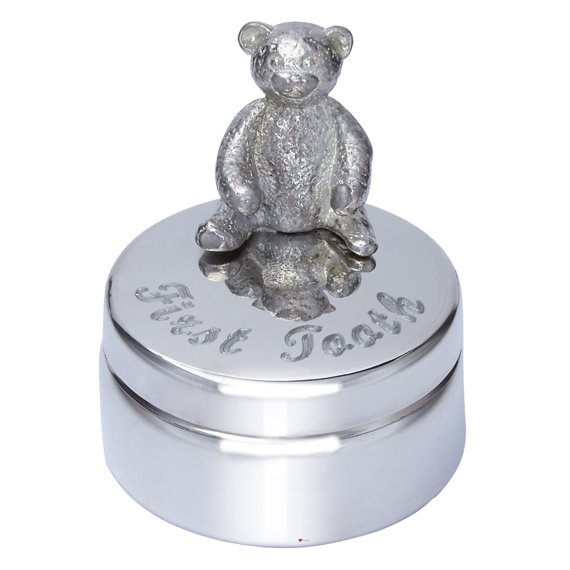Silver teddy bear on a round silver base with 'First Tooth' engraving on a white background