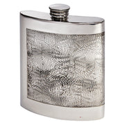 Silver hip flask with a geometric pattern on a white background