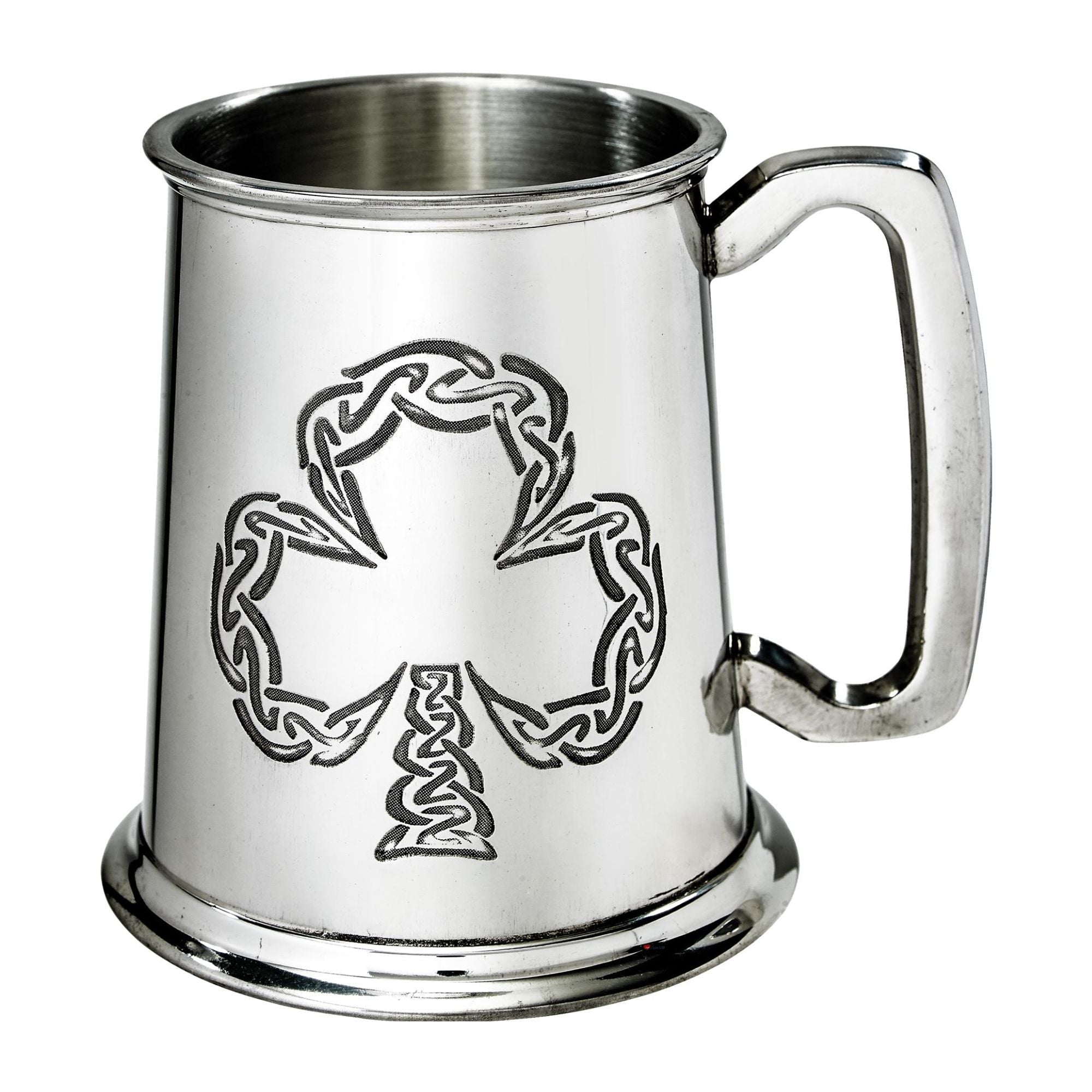 Silver tankard with a shamrock design on a white background