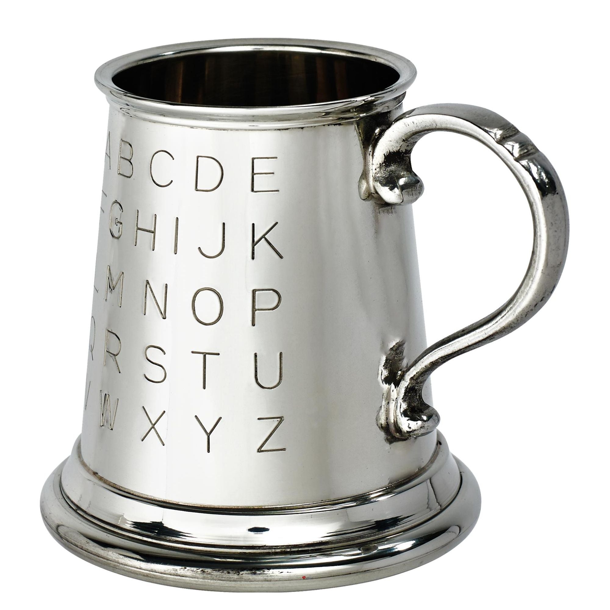 Silver tankard with engraved letters on a white background
