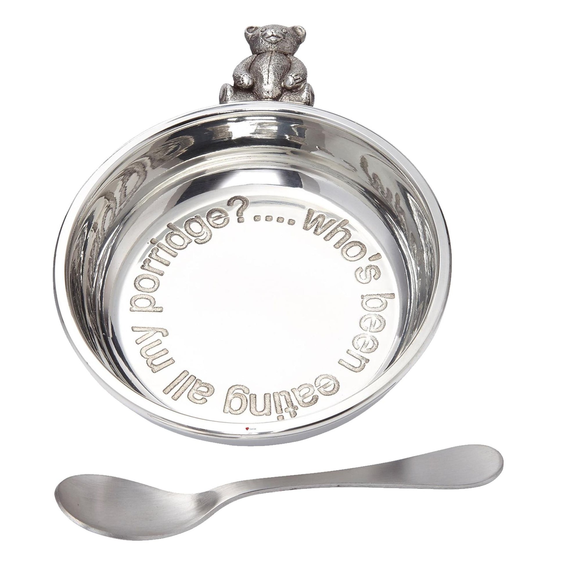 Silver porridge bowl with a bear handle and spoon on a white background