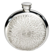 Silver flask with intricate design on a white background
