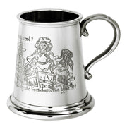 Silver tankard with engraved design on a white background