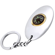 White keychain with a compass on a white background