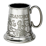 Silver tankard with engraved designs and 'GRANDSON' text on a white background