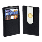 Black cardholder with credit cards and a metal clip on a white background