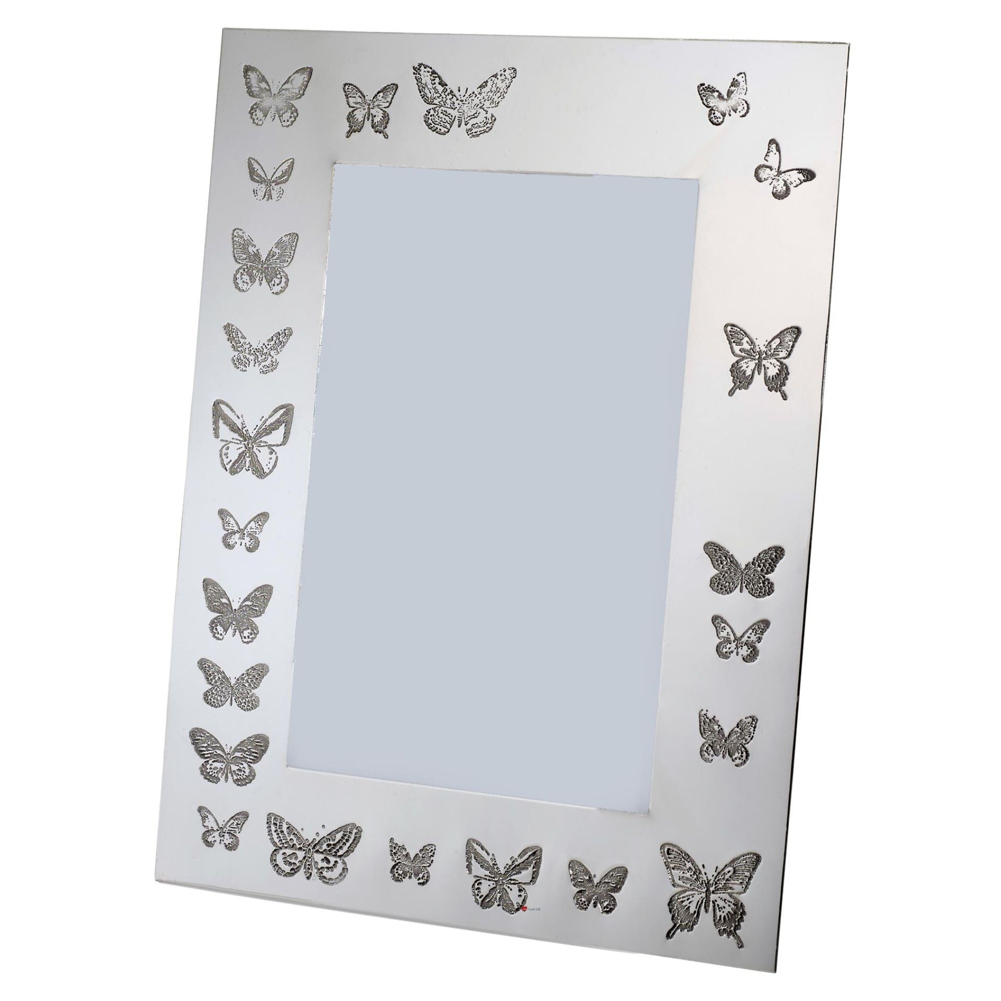 Decorative photo frame with butterfly designs on a white background