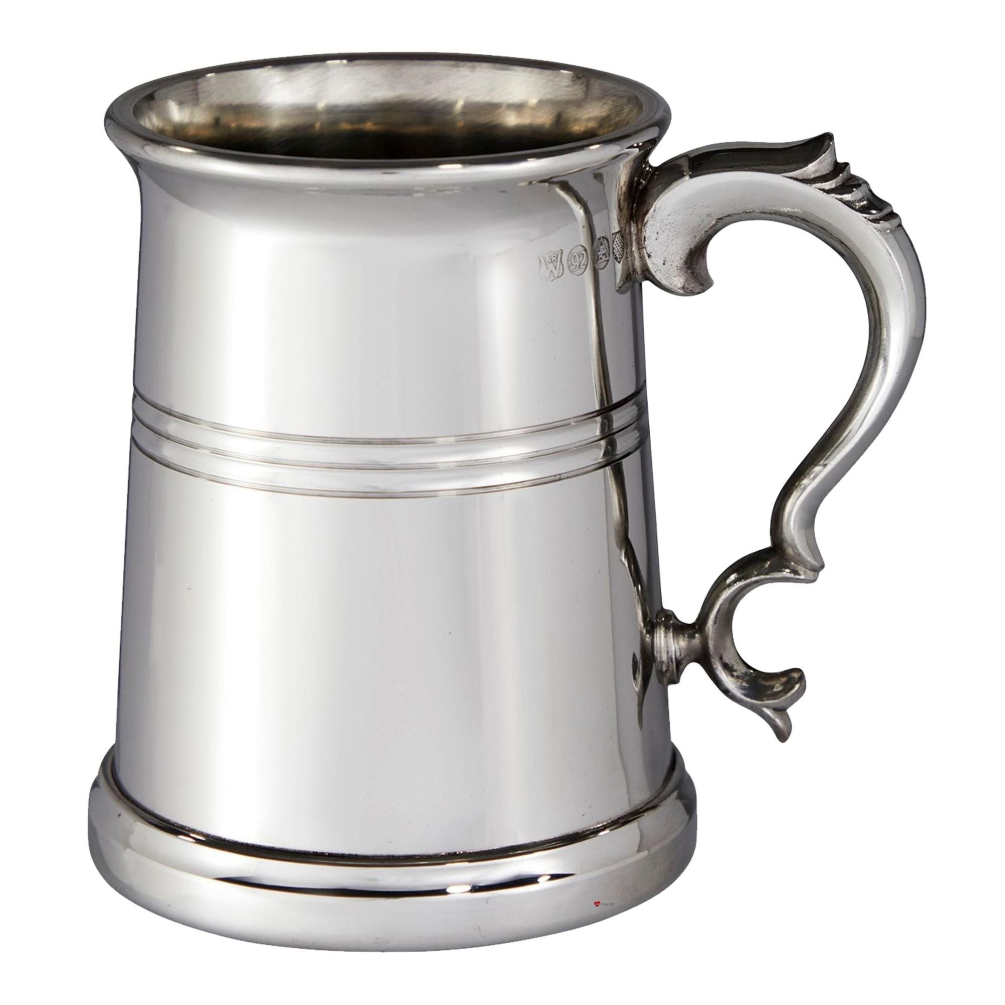 Silver tankard with a decorative handle on a white background