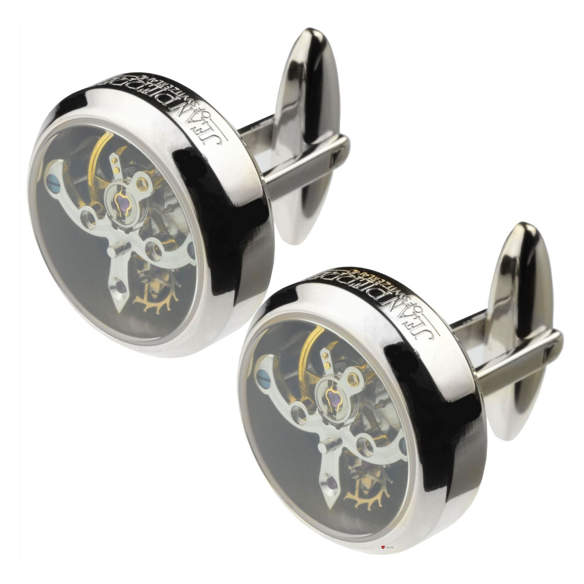 Silver cufflinks with mechanical design on a white background