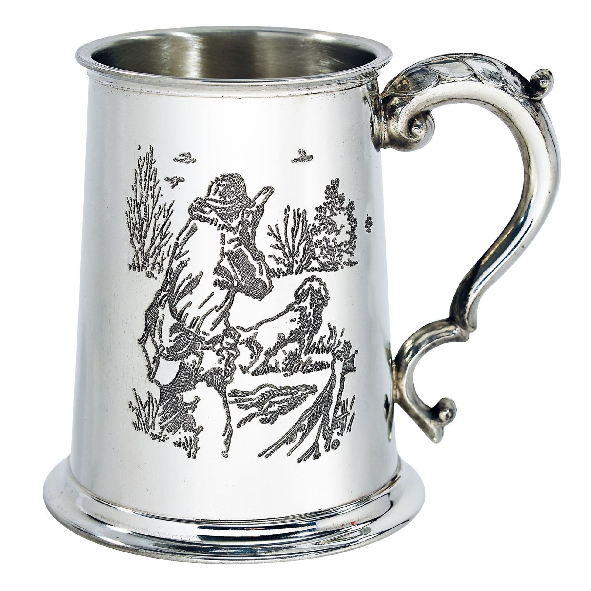 Silver tankard with engraved design of a person on horseback in a natural setting.