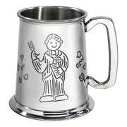 Silver tankard with engraved design of a person holding a book on a white background