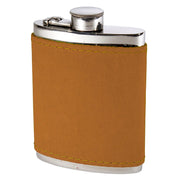 Flask with brown leather wrap and silver cap on a white background