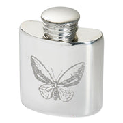 Silver hip flask with butterfly engraving on a white background