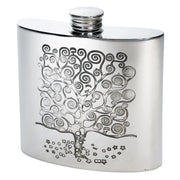 Silver hip flask with tree design on a white background