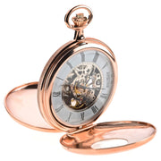 Rose gold pocket watch with open face on a white background