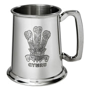 Silver tankard with engraved emblem and 'Cymru' text on a white background