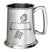 Silver tankard with engraved design on a white background
