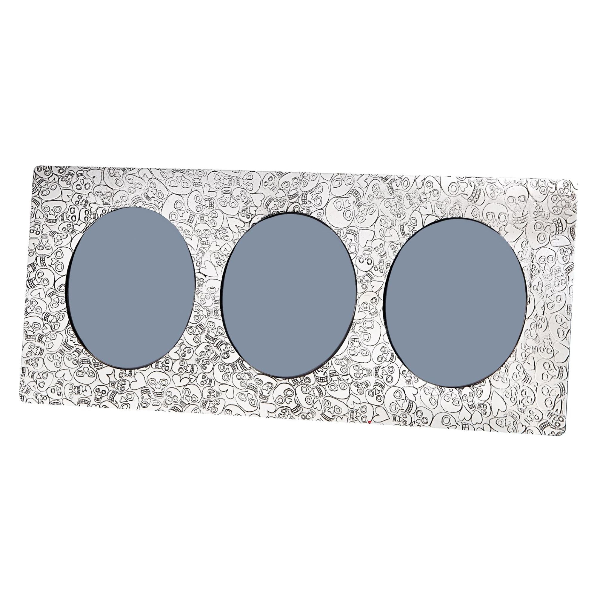 Three blue oval lenses in a decorative case with a white background