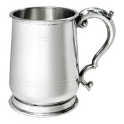 Silver tankard with a handle on a white background