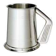 Silver tankard with handle on a white background