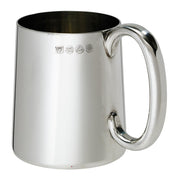 Silver mug with handle on a white background