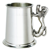 Silver tankard with a mermaid handle on a white background