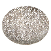 Decorative bowl with intricate pattern on a white background