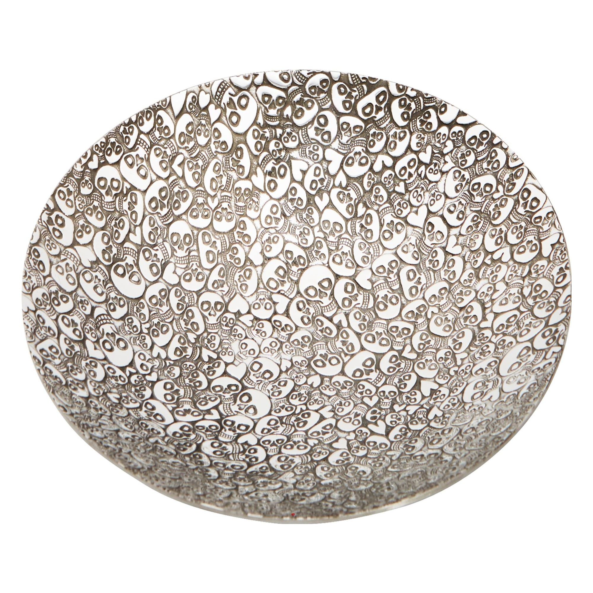 Decorative bowl with intricate pattern on a white background
