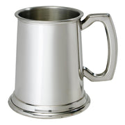 Silver tankard on a white background