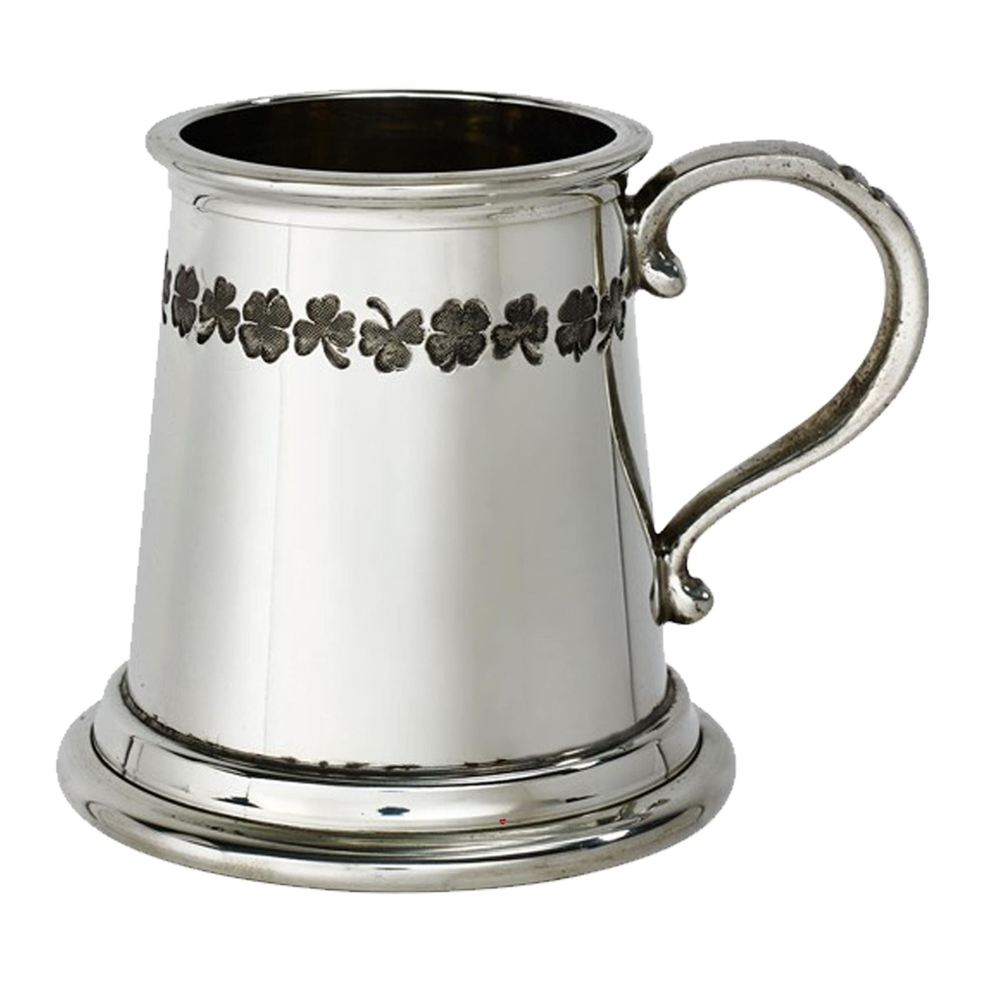 Silver tankard with cloverleaf design on a white background