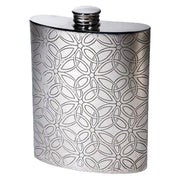 Silver hip flask with intricate pattern on a white background