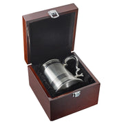 Silver tankard in a wooden gift box on a white background