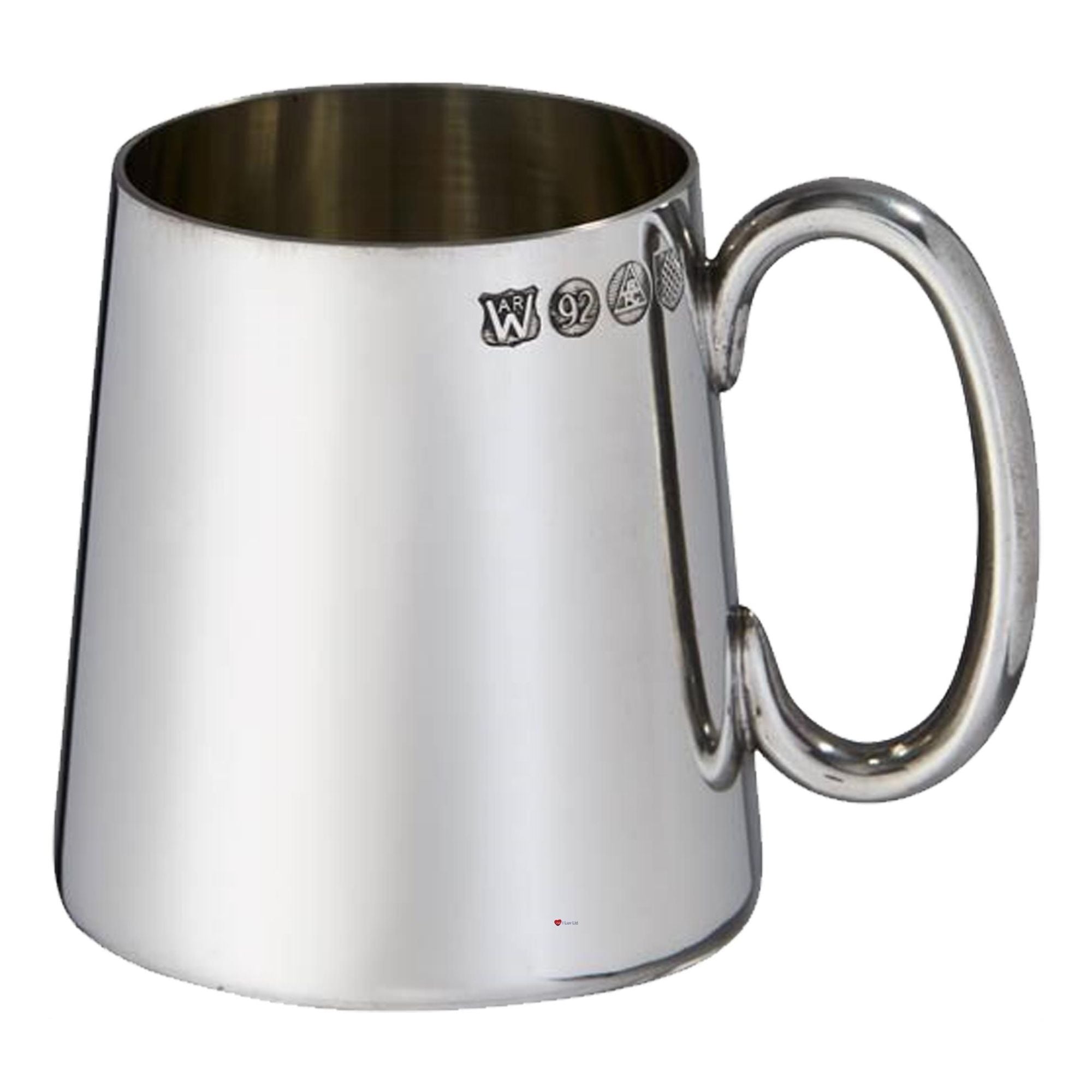 Silver mug with engraved symbols on a white background