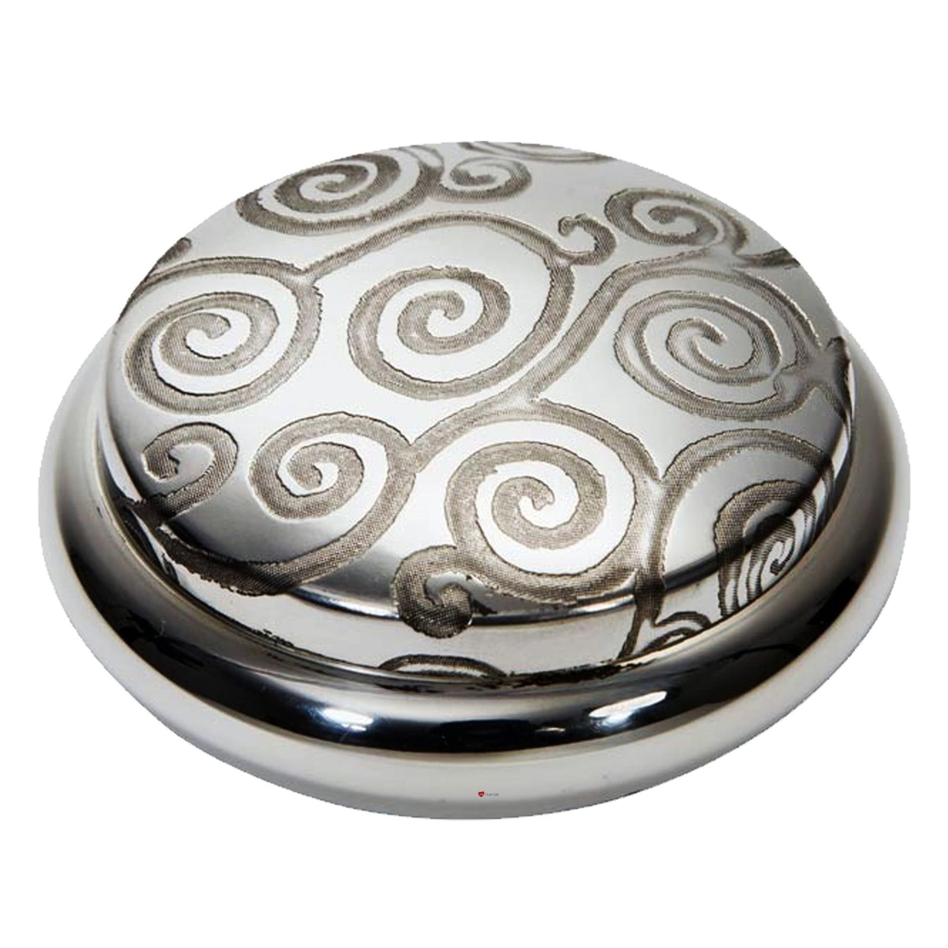 Decorative round object with silver spiral patterns on a white background