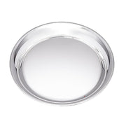 Round metallic object on a white background