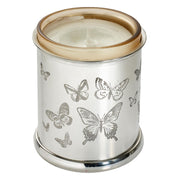 Silver candle holder with butterfly designs on a white background