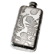 Silver flask with intricate floral engraving on a white background